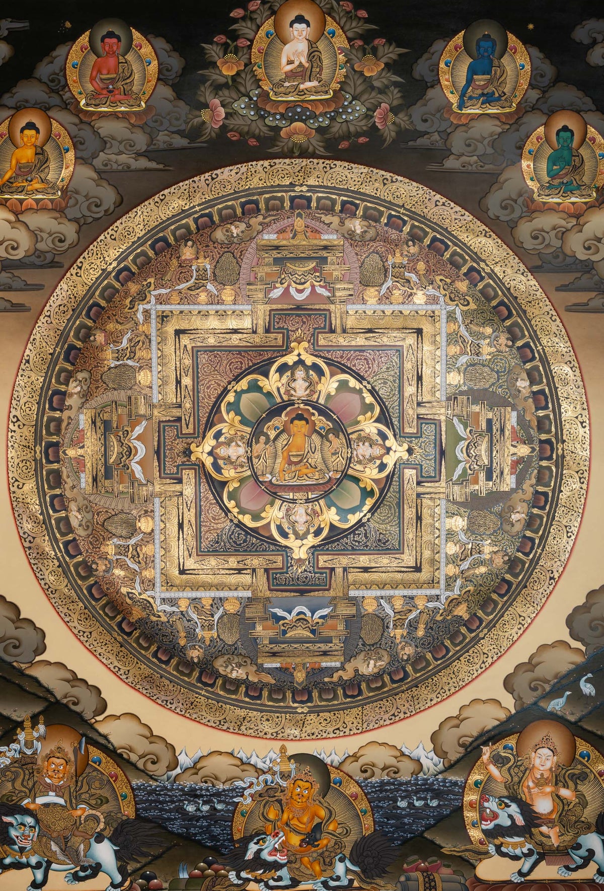 Tibetan Buddhist Buddha Mandala thangka featuring a central seated Buddha within a sacred geometric mandala, surrounded by the Five Dhyani Buddhas, protective deities, and ritual palace architecture, intricately hand-painted in traditional Tibetan style.