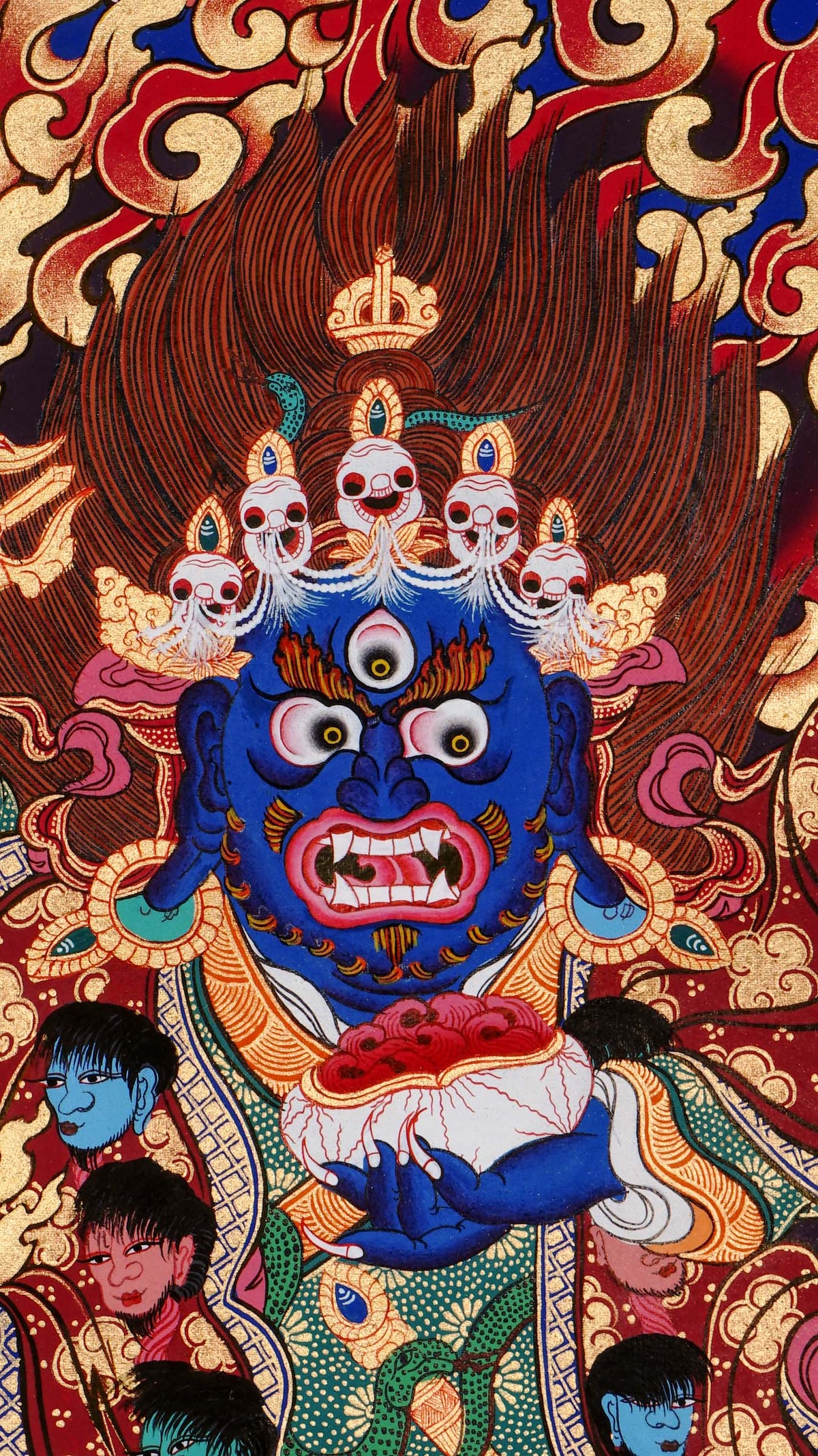 Hand-painted Mahākāla thangka from Kathmandu, Nepal depicting the wrathful protector deity with dark blue body, skull crown of five skulls, garland of severed heads, holding skull cup and curved knife, surrounded by red flames in traditional Tibetan Vajrayana style.