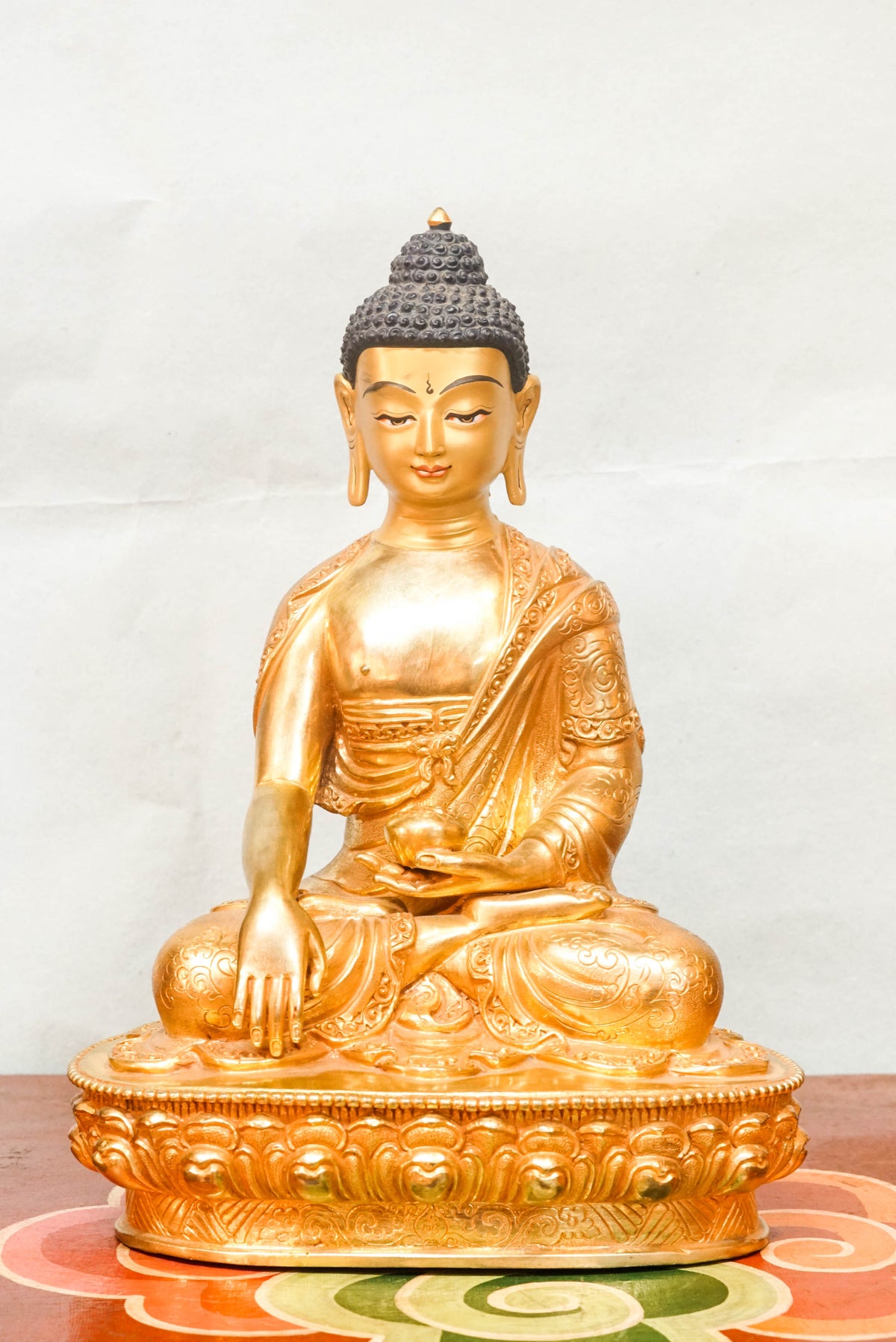 Statue of Sha Buddha, representing the historical Buddha in a meditative pose, embodying wisdom, peace, and spiritual awakening.