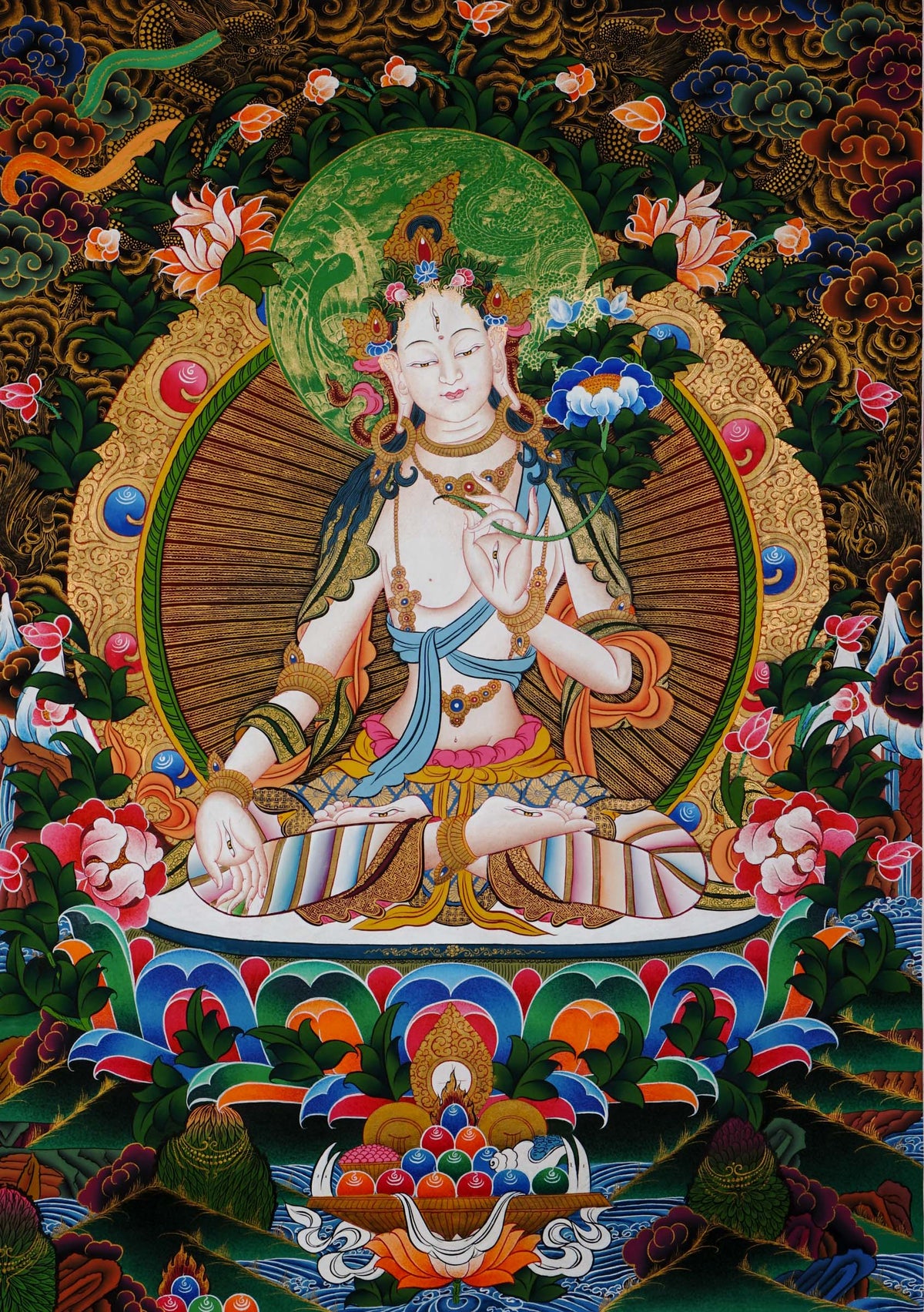 Hand-painted White Tara thangka from Kathmandu, Nepal, depicting the goddess of compassion and long life with seven eyes, seated on a lotus throne, holding a lotus stem, adorned with flowing robes, floral patterns, and gold accents.