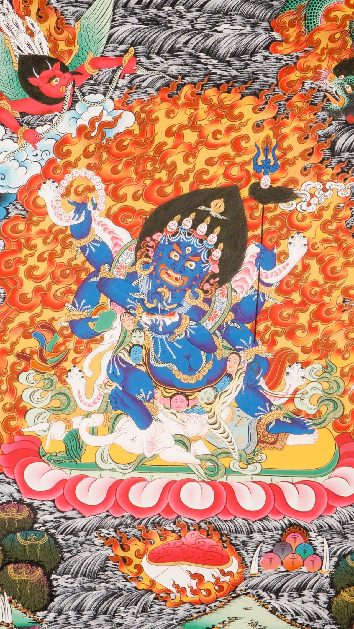 The 6-Hand Mahakala Thangka symbolizes fierce protection and obstacle removal, hand-painted with vibrant pigments and gold leaf for spiritual strength and presence.