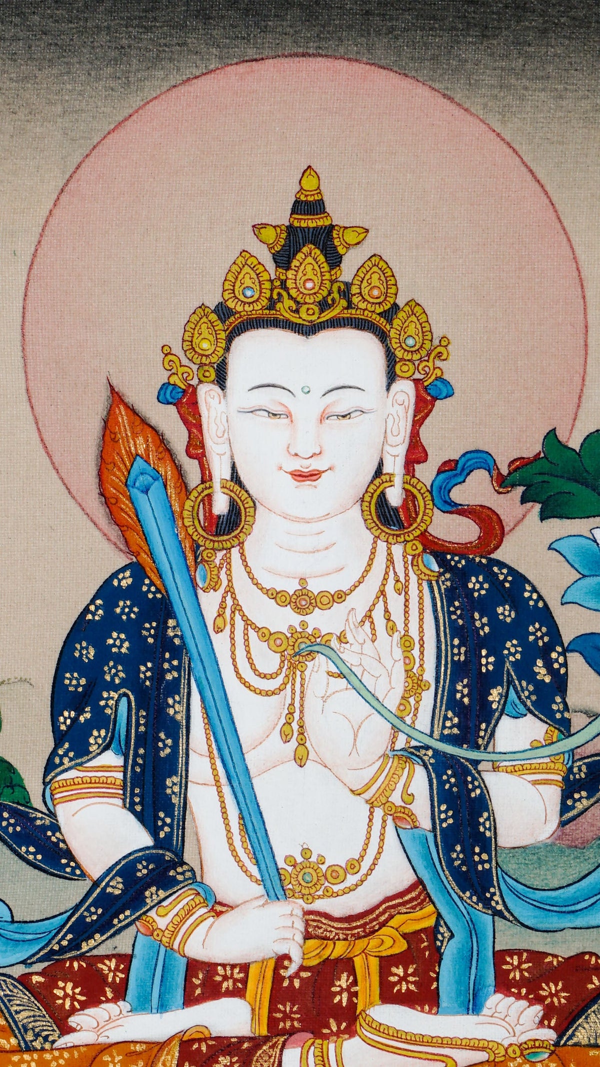 Tibetan Buddhist thangka of Akash Bhairav seated in Padmasana, smiling, holding a sword in the right hand and a lotus in the left, hand painted in Kathmandu, Nepal with natural mineral pigments.