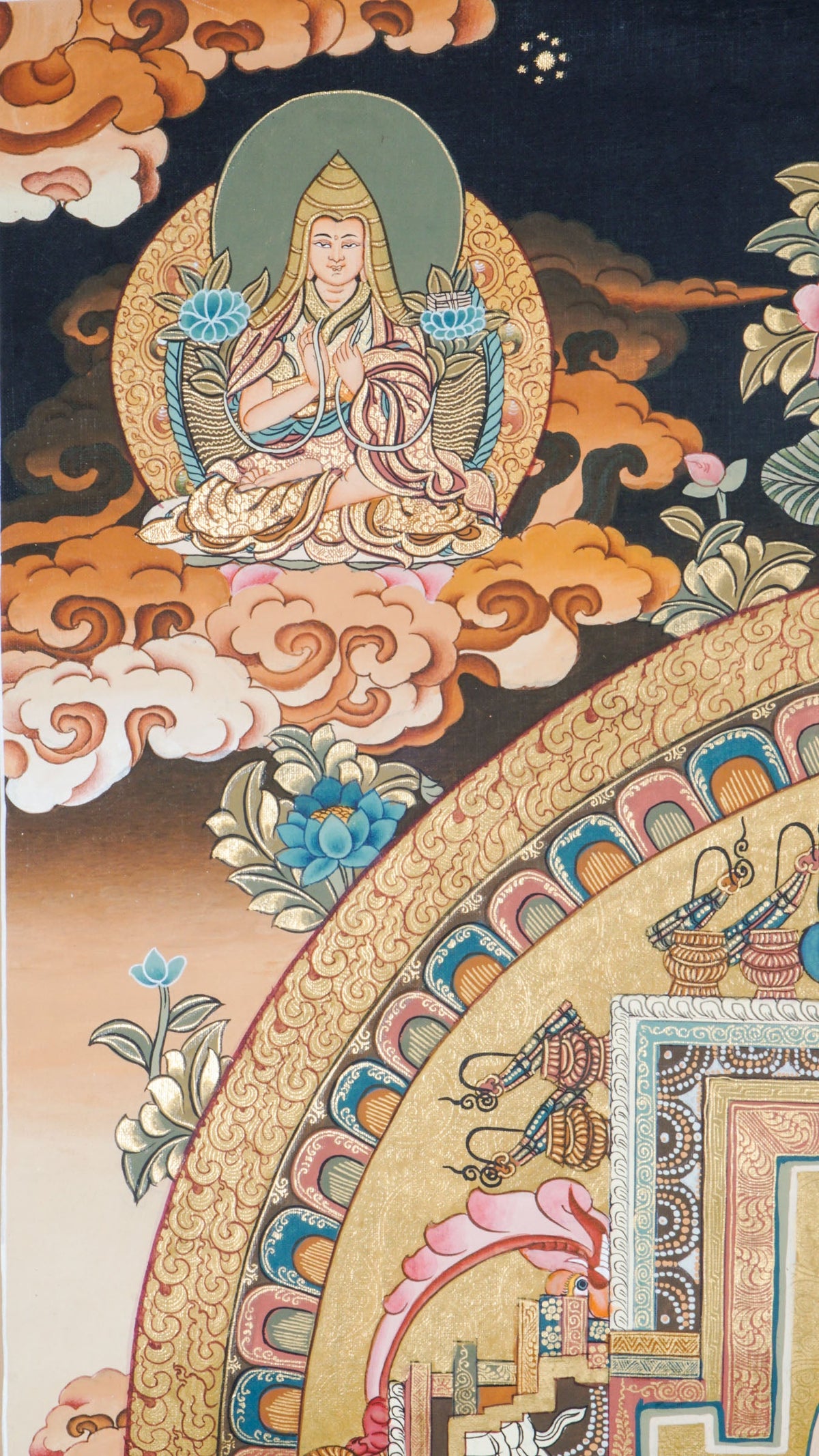 Avalokiteshvara Mandala Tibetan Thangka painting featuring the Bodhisattva of Compassion at the center, surrounded by a sacred geometric mandala, deities, lotus motifs, clouds, and symbolic Himalayan Buddhist iconography. Traditional hand-painted Buddhist mandala art with natural mineral pigments, ideal for meditation, spiritual practice, altar decor, and sacred wall hanging.