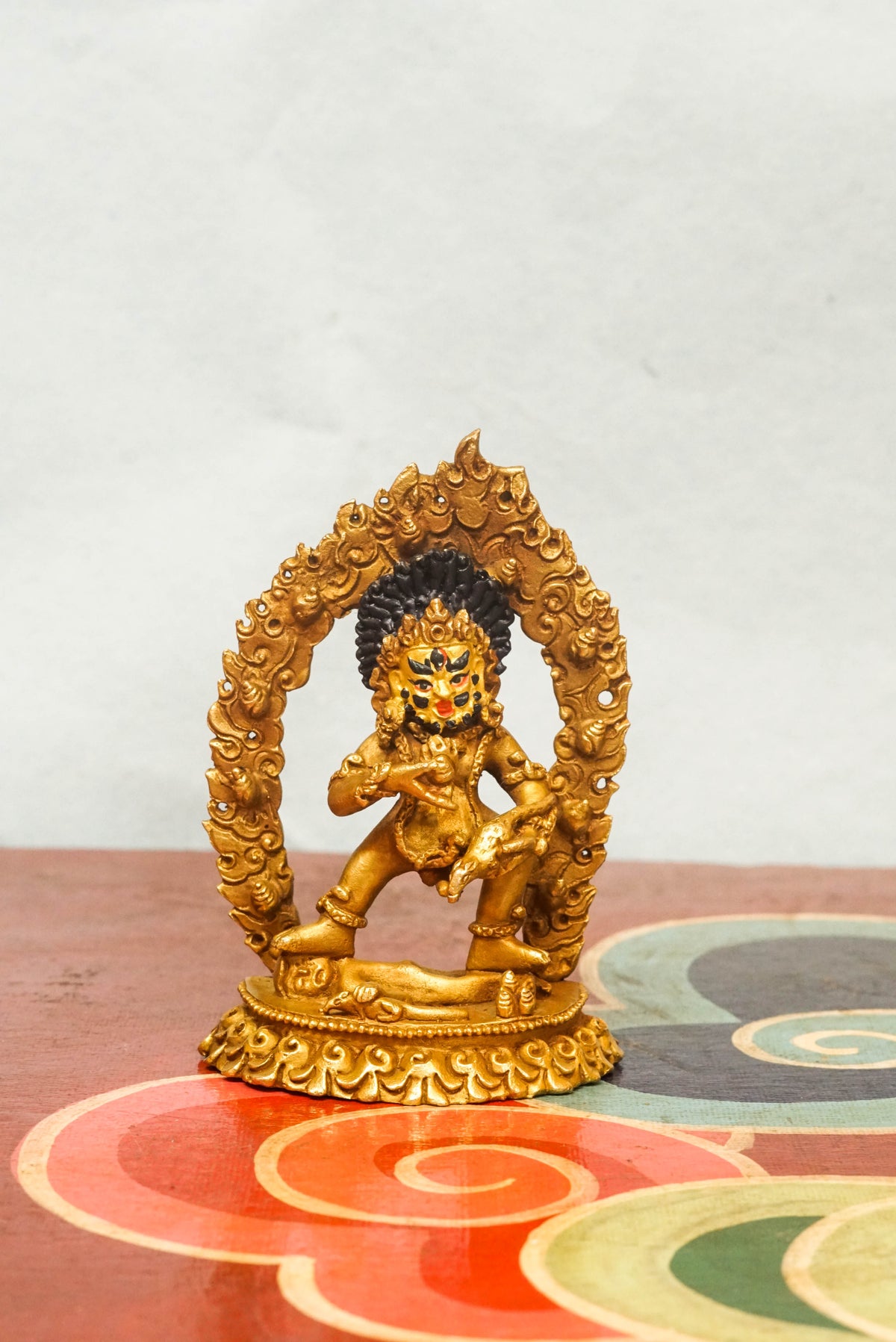 Small Black Zambala statue, the Buddhist deity of wealth and protection, handcrafted in copper metal, traditionally worshipped for removing financial obstacles and attracting prosperity.