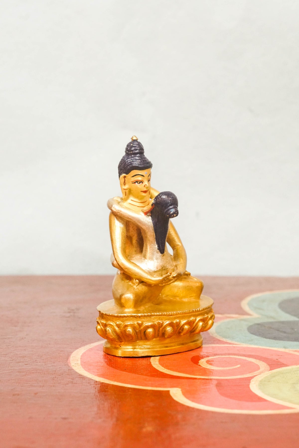 Buddha Shakti statue depicting the sacred union of masculine and feminine spiritual energy, seated in meditation on a lotus pedestal, symbolizing compassion, wisdom, and divine balance in Buddhist art.