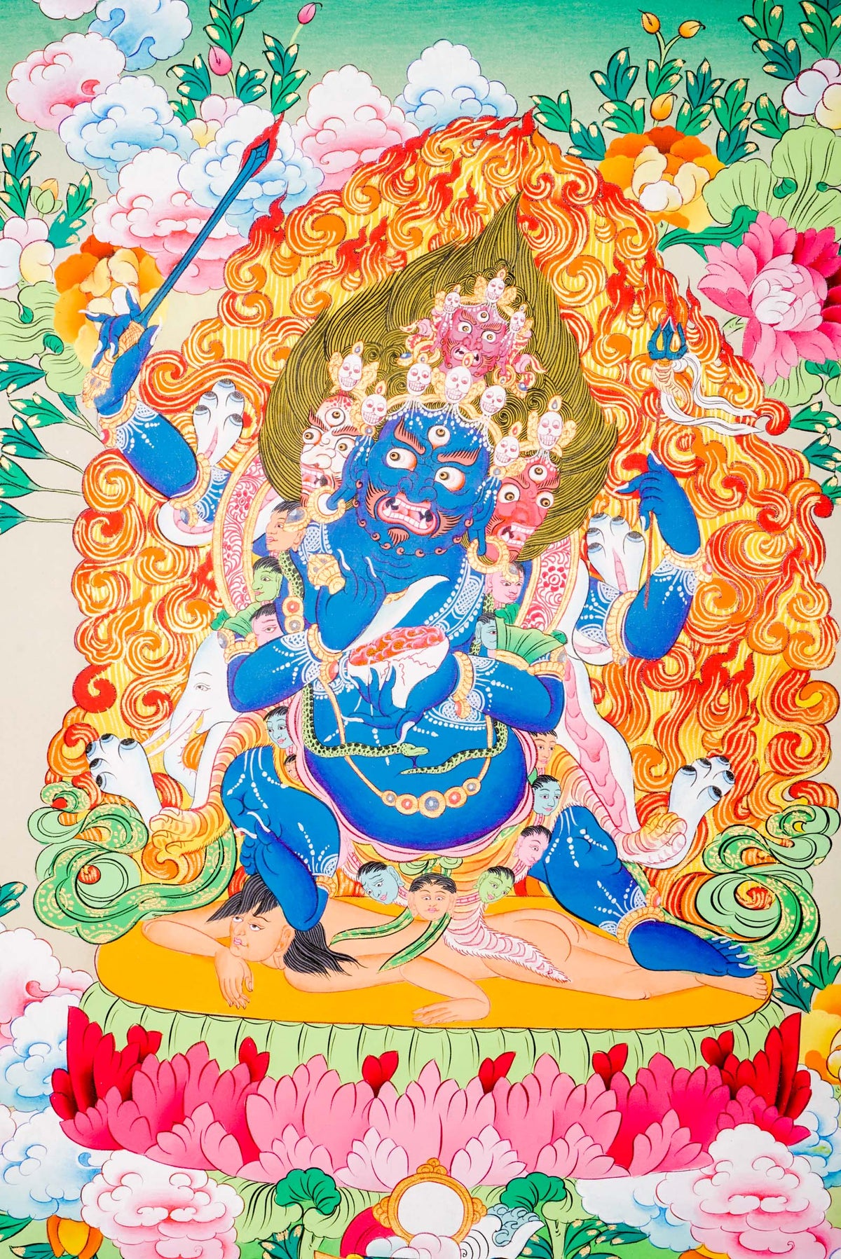 A sacred hand-painted Thangka Art using 24k gold and natural pigments of Mahakala, the fierce protector.