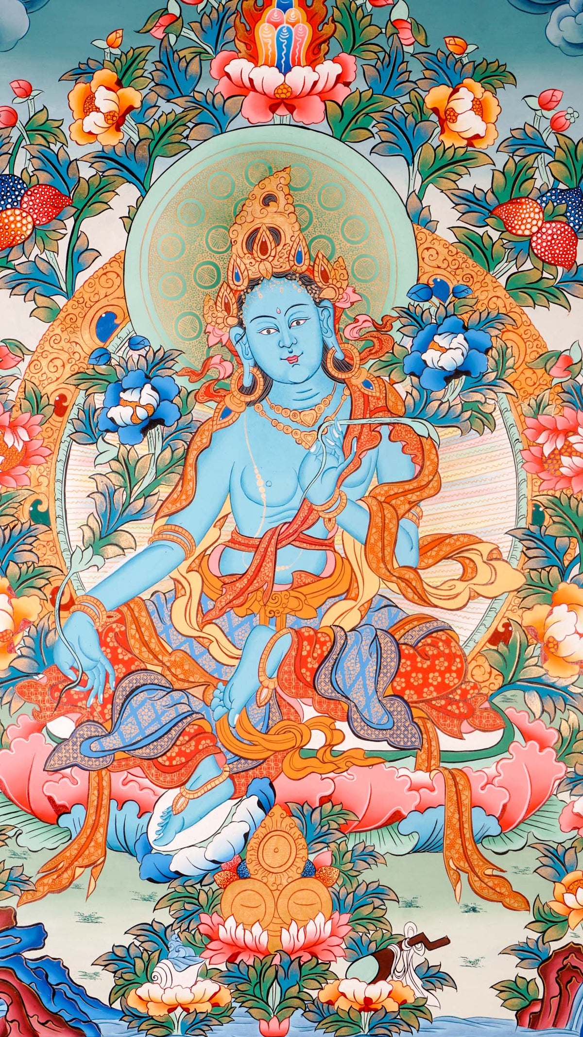 Tibetan thangka of Green Tara in a blue-green form seated in lalitasana on a golden lotus throne, holding a lotus and showing the varada mudra, surrounded by flowers and a peaceful background.