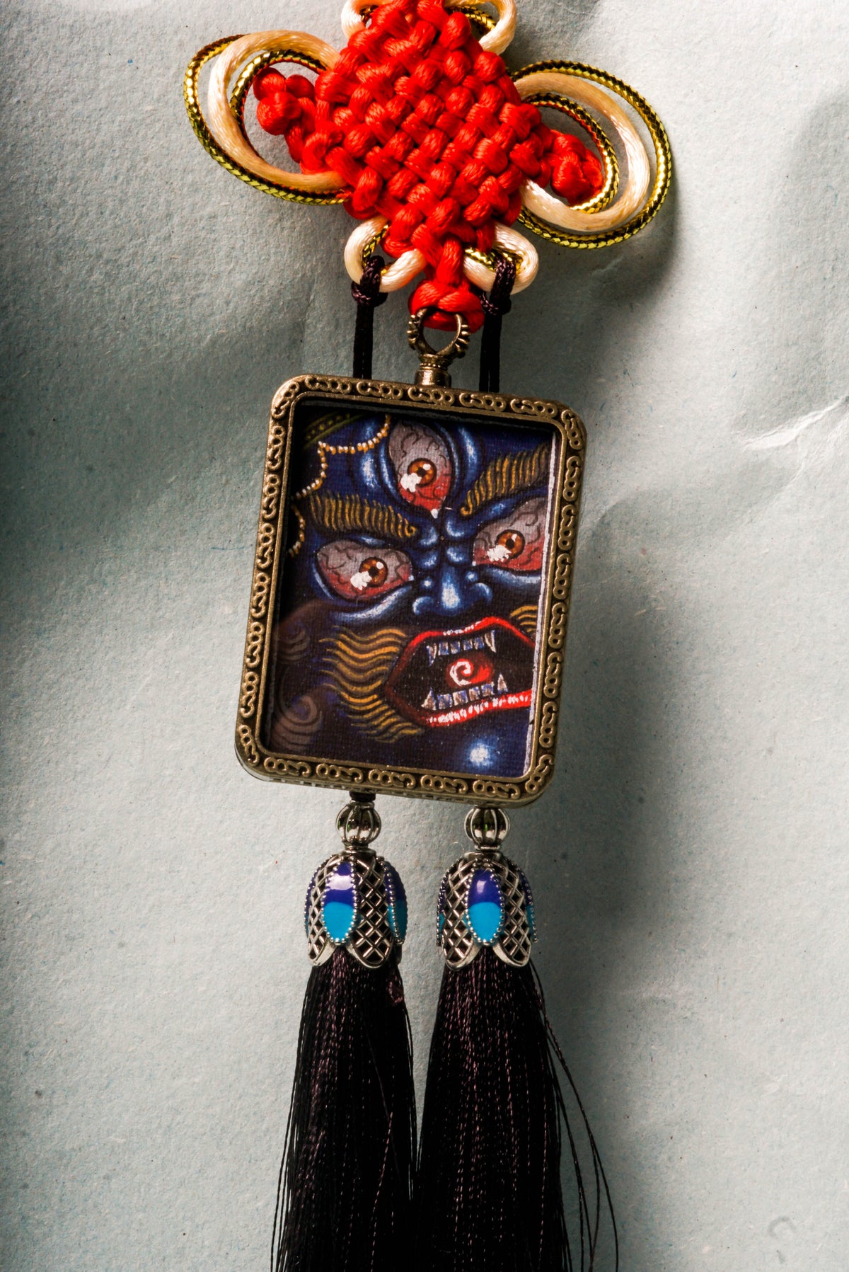 Mahakala, the fierce guardian in Tibetan Buddhism, symbolizes protection, transformation, and the removal of spiritual obstacles. This hand-painted Mahakala Ghau Thangka serves as both a sacred artwork and a powerful talisman, perfect for deepening meditation and invoking divine protection.