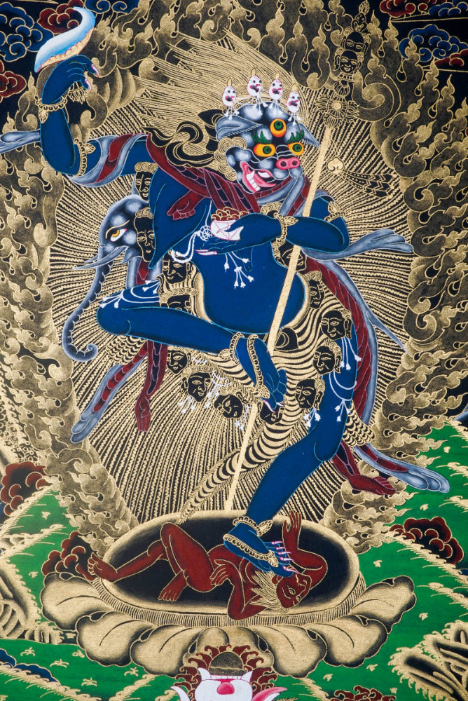 Simhamukha, the Lion-Faced Dakini, is a fierce protector in Tibetan Buddhism, symbolizing wisdom that cuts through ignorance and negativity. This hand-painted Thangka, crafted with natural pigments by skilled artisans, invites clarity, strength, and spiritual protection into your space.
