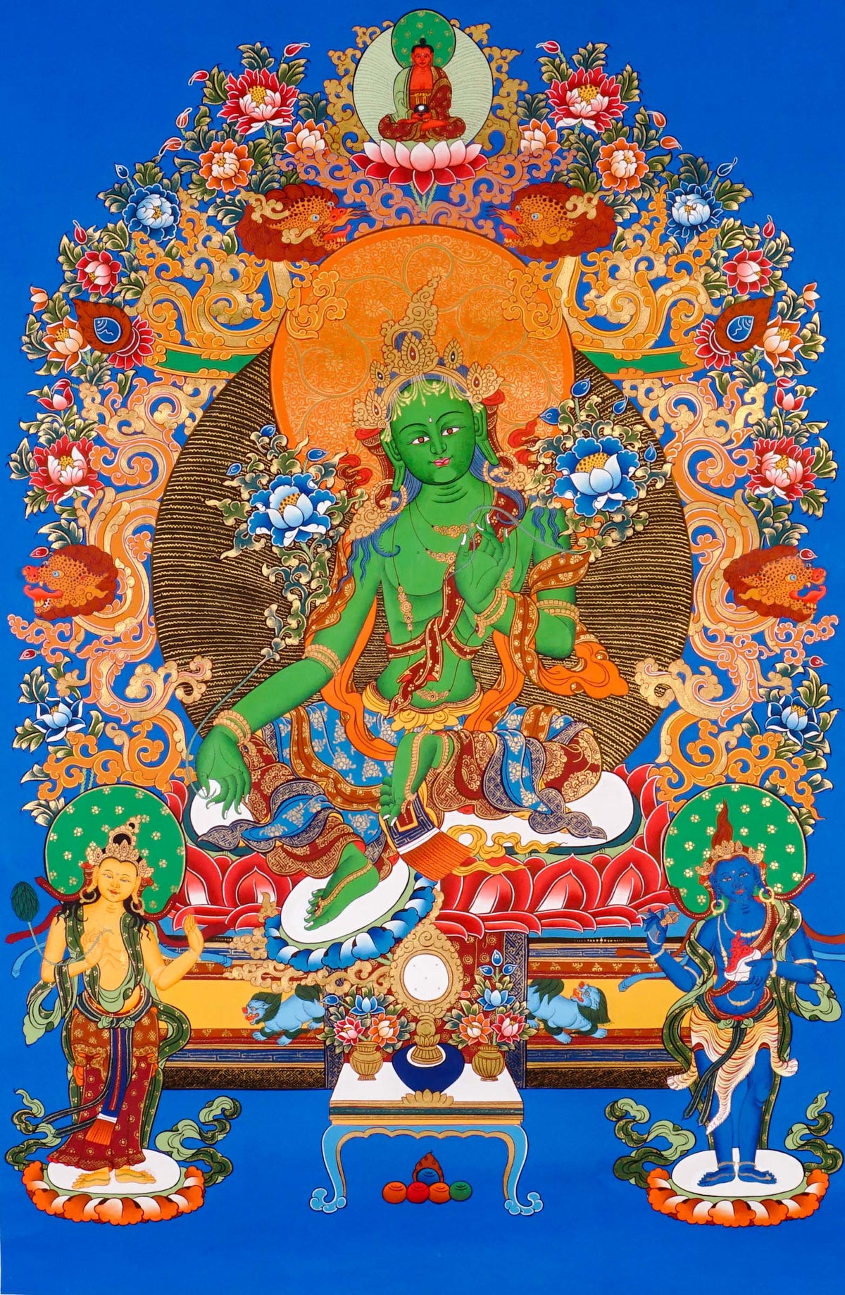 Hand-painted Green Tara thangka featuring the Tibetan Buddhist goddess seated on a lotus throne surrounded by sacred floral motifs and celestial symbolism
