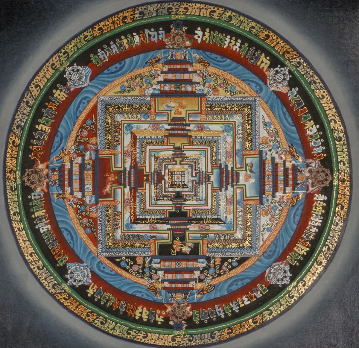 Kalachakra Mandala thangka depicting a sacred geometric palace with concentric circles, square inner sanctum, directional gateways, and Tibetan script representing the Wheel of Time.